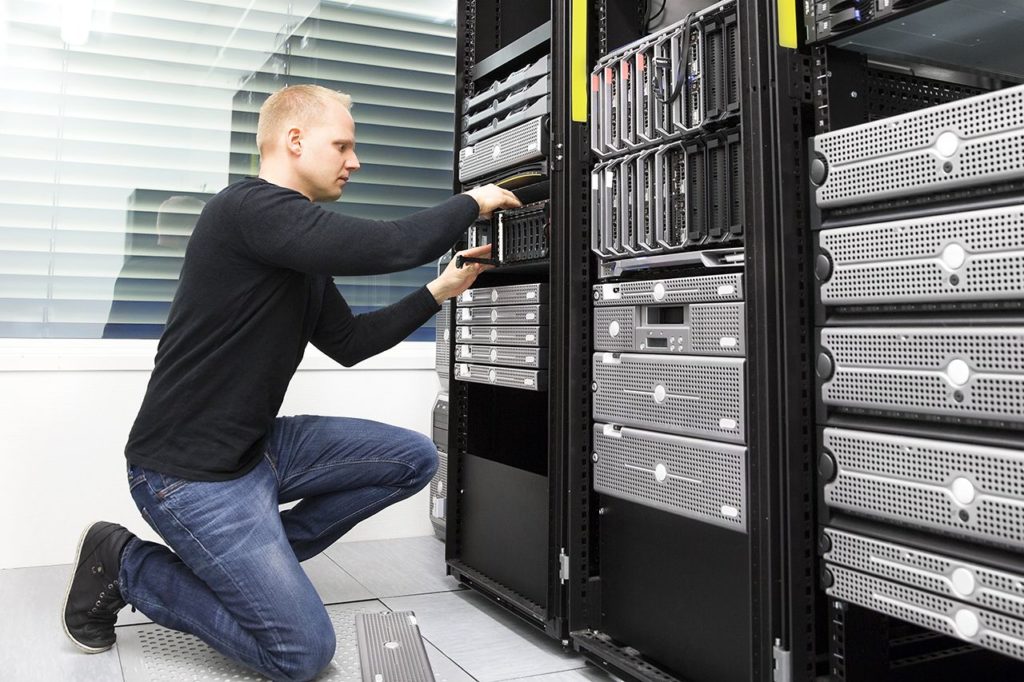 an IT engineer working in a server room