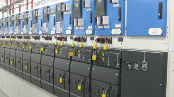 a row of electrical generator switches